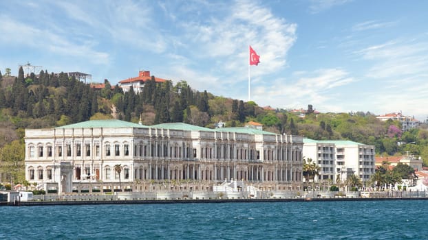 View from the Bosphorus strait of Ciragan Palace Kempinski, a luxury hotel located in Istanbul, Turkey. The palace was built in the 19th century and is now a popular tourist destination