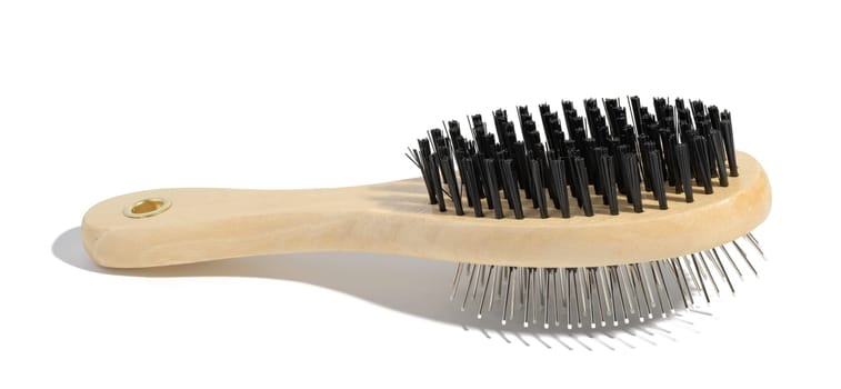 Wooden brush for animals on a white isolated background