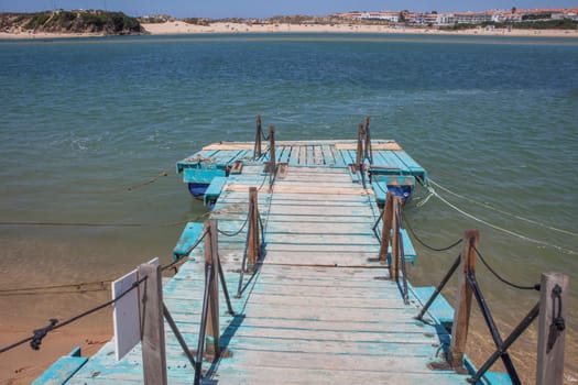 Vila Nova de Milfontes, little picturesque town on the Alentejo coast, Portugal. Pier of Furnas beach