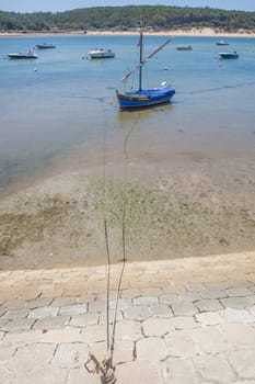 Vila Nova de Milfontes street. Little picturesque town on the Alentejo coast, Portugal. Marina and promenade