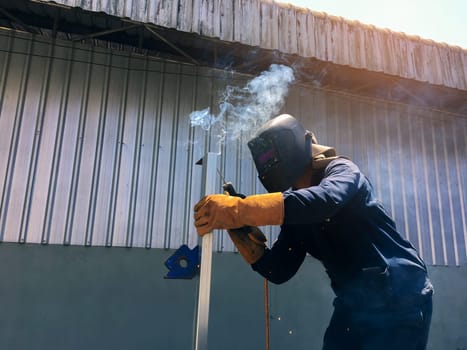 Welding Metal, Man welding steel blurred background, Welder concept, Welding Electrodes,  Filter color style