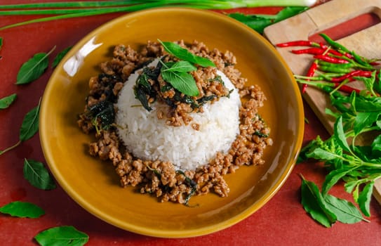 Minced pork with basil over rice is a Thai food that is popular among Thai people because it is delicious and easy to eat