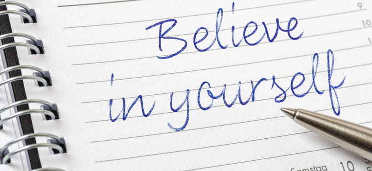 Believe in yourself written on a calendar page