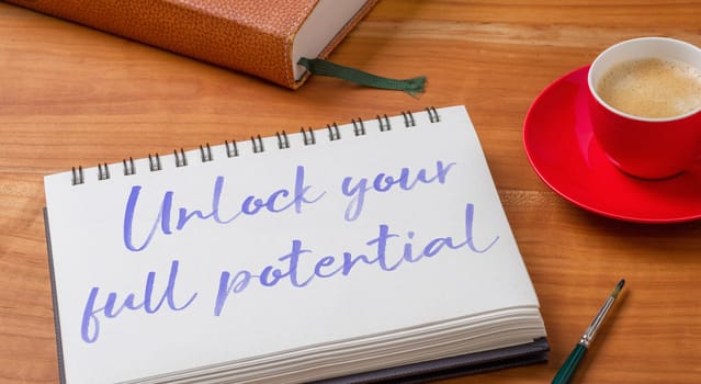 Notepad on a desk - Unlock your full potential