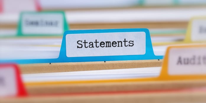 File folders with a tab labeled Statements