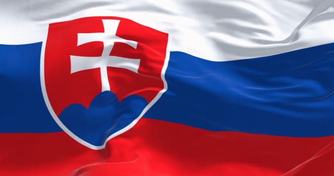 Close-up of Slovakia national flag waving in the wind on a clear day. White, blue, and red stripes. Coat of arms at the hoist. 3d illustration render. Rippled fabric