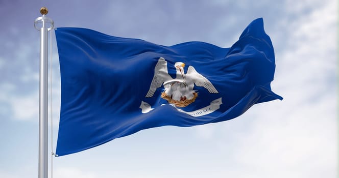 Louisiana state flag waving on a clear day. Mother pelican in a blue area with the slogan of the state. US state. 3d illustration render. Fluttering fabric