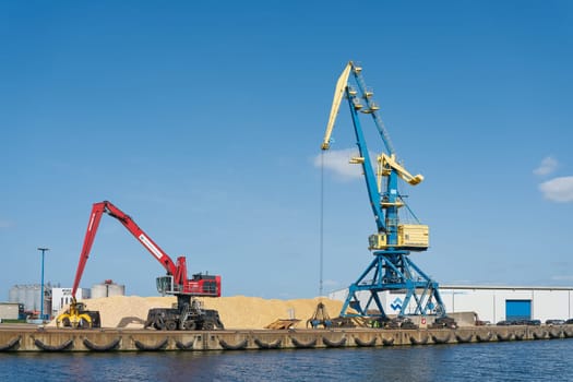 Cranes in the port of Wismar in Germany for loading and unloading ships