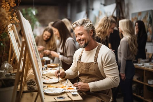 Painting class with multicultural adult students of different age, learning a new skill, art workshop, leisure activity in a group