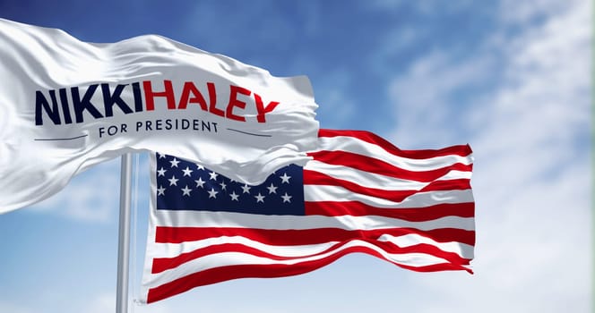 Washington D.C., US, June 15 2023: Nikki Haley 2024 presidential election campaign flag waving on a clear day. Illustrative editorial 3d illustration render. 2024 United States presidential election