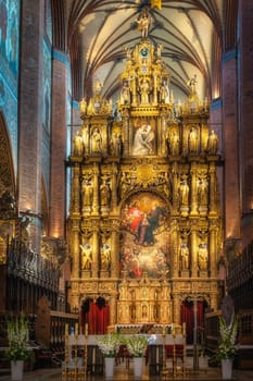 Closeup on amazing, golden and ornate altar of Church of the Assumption of the Blessed Virgin Mary, Cathedral Basilica in Pelplin, Poland