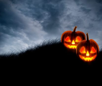 Halloween background wallpaper with jack o lantern scary pumpkins on dark sky. Halloween party invitation design layout. Spooky halloween poster.