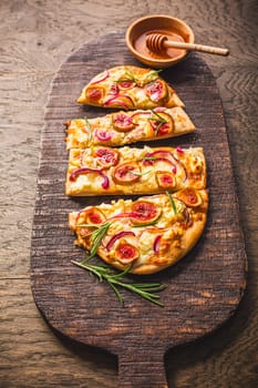 French Tarte Flambee (Flammkuchen) with figs, red onions, soft goat cheese and honey