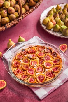 French fig clafoutis with almonds in baking form, glutenfree dessert