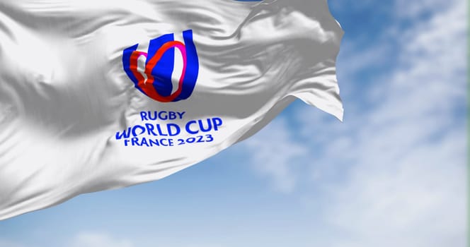 Paris, FR, Sept 8 2023: Flag of Rugby World Cup 2023 waving on a clear day. The event is scheduled in France from 8 September to 28 October 2023. Illustrative editorial 3d illustration render