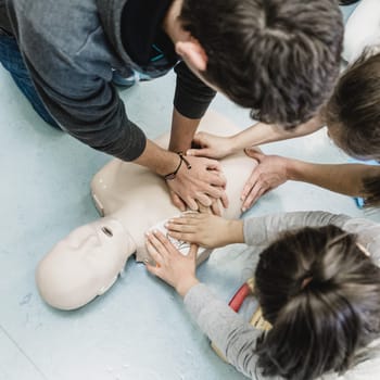 First aid cardiopulmonary resuscitation course using automated external defibrillator device, AED.