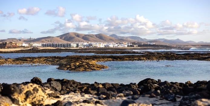 Panoramic view of El Cotillo city in Fuerteventura, Canary Islands, Spain. Scenic colorful traditional villages of Fuerteventura, El Cotillo in northen part of island. Canary islands of Spain.