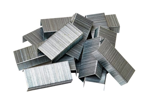 Closeup of a stack of metal staples for stapler isolated on a white background. Clipping path. Office equipment. Macro.
