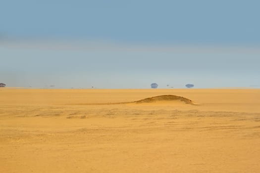 Fata Morgana (mirage) on the horizon of Sahara. Egypt near Aswan City.
