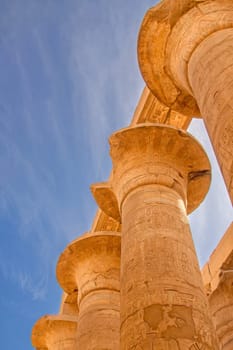 Ancient columns with beautiful carvings. Karnak Temple. The Great Hypostyle Hall, Luxor, Egypt