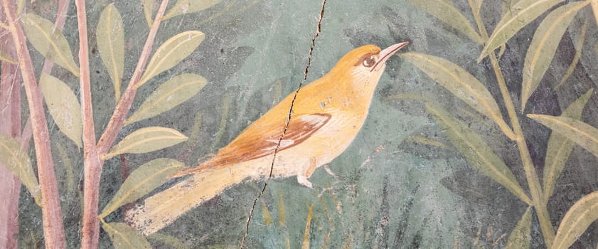 Italy, Pompeii - Luxury roman house interior, fresco detail with bird in a garden, 79 AD