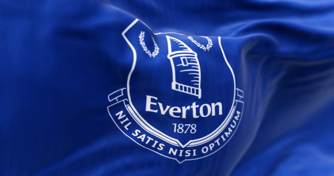 Liverpool, UK, Sept. 21 2023: Close-up of Everton Football Club flag waving. Professional english football club. Illustrative editorial 3d illustration render. Rippled fabric background