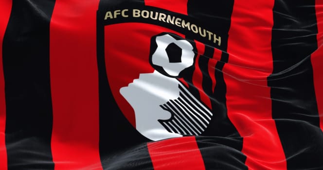 Bournemouth, UK, Sept. 4 2023: Close-up of AFC Bournemouth flag waving. English football club based in Kings Park, Boscombe. Illustrative editorial 3d illustration render. Rippled fabric