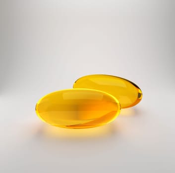 Golden oil capsule of vitamin A, E, Omega 3 or collagen. of medical pill with fish fat or organic cosmetic oil