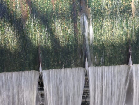 water falling in the form of waterfall waterfall fountain spring