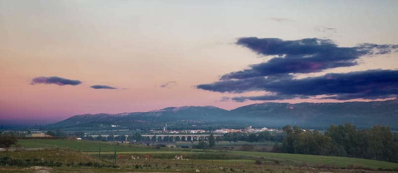 Acedera town overview at sunset. Orellana Irrigation canal Aqueduct. Vegas Altas del Guadiana, Extremadura, Spain