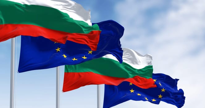Flags of Bulgaria and the European Union waving in the wind on a clear day. Bulgaria became a member of the EU in January 2007. 3d illustration render. Fluttering textile