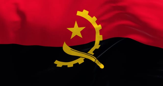 Close-up of Angola national flag waving in the wind. Two horizontal bands, red and black, with a yellow emblem in the center. 3d illustration render. Fluttering fabric background