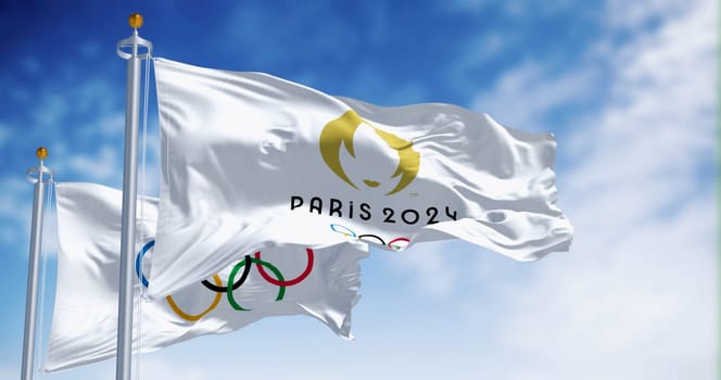 Paris, FR, Sept 12 2023: Paris 2024 and the Olympics Games flags waving in the wind. International sporting event. Illustrative editorial 3d illustration render.