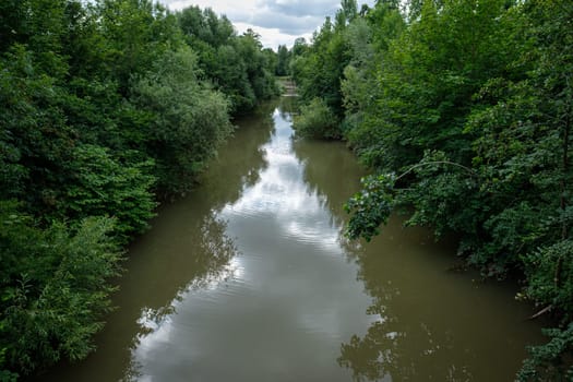 German river Rems with green bushes and trees
