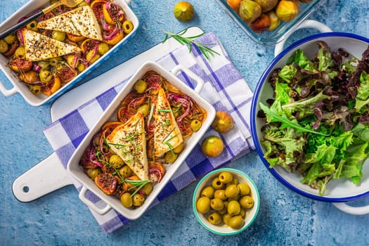 Baked sheep cheese, feta cheese with olives, figs, onions and green salad (Bouyiourdi)