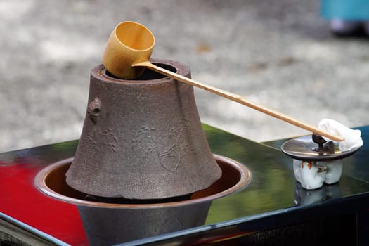 Tea set for traditional japanese green tea ceremony, iron pot, ladle, outdoors