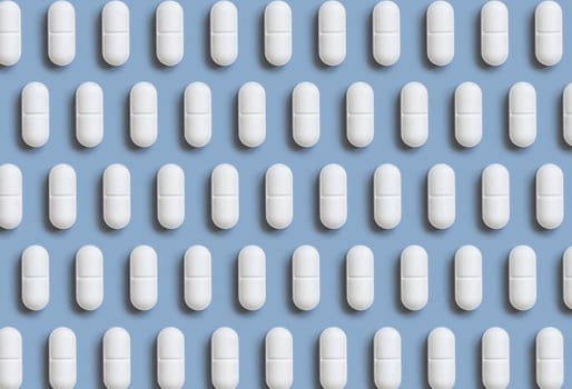 White pills on light blue top view, creative pattern. Curative medicine and healthcare, taking dietary supplements and vitamins. Pharmaceutical pills