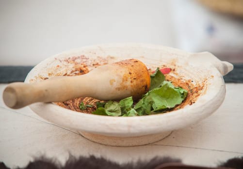 Mortarium or roman mortar with food. Ancient roman gastronomy concept