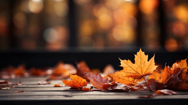 autumn yellow leaves on a wooden table against the background of a blurred image of an autumn landscape on a sunny day
