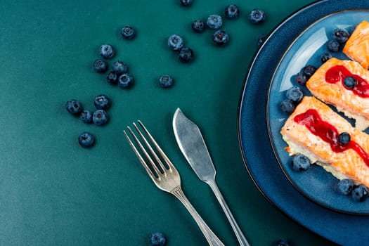 Fried salmon fillet with blueberry berry sauce. Healthy food. Space for text.