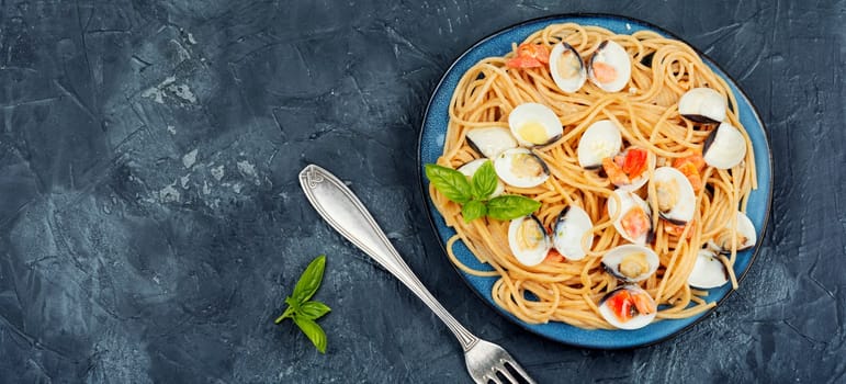 Linguini with clams, seafood pasta with clams and spaghetti. Space for text