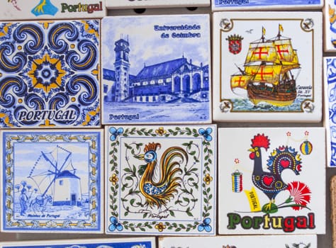 Coimbra, Portugal - Sept 6th 2019: Glazed tiles magnets with traditional portuguese motifs, Coimbra Old Town, Portugal
