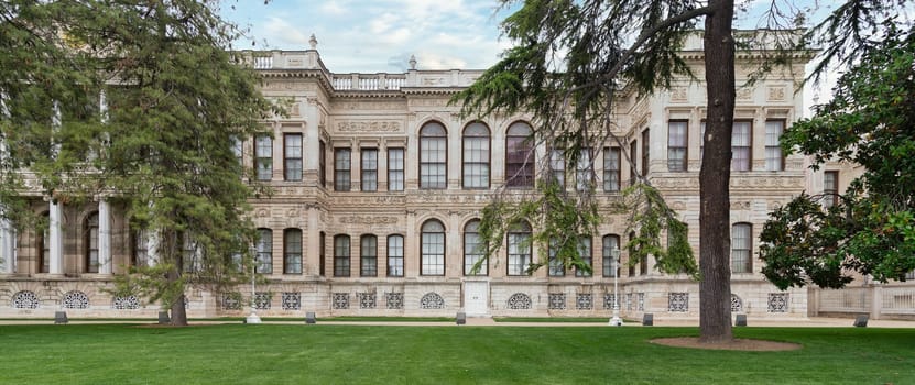 Side faced of Dolmabahce Palace, or Dolmabahce Sarayi, located in Besiktas district on the European coast of the Bosporus, main administrative center of the Ottoman Empire formerly, Istanbul, Turkey