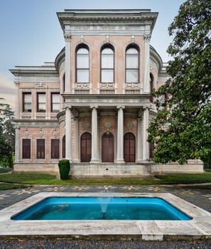 Historic Ottoman 19th century Mecidiye Pavilion, located in Beykoz, Istanbul, Turkey. The pavilion is surrounded by beautiful gardens and features a large fountain in front of the building