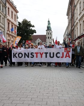 Cracow, Poland - October 1, 2023: Million Hearts March in Krakow. Crowds of Poles march through the streets of Krakow protesting against PiS's rule
