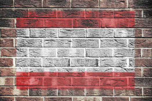A Tahiti flag on a brick wall background