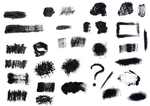 Swatch of black smudged acrylic paint isolated on white background, close up. Set