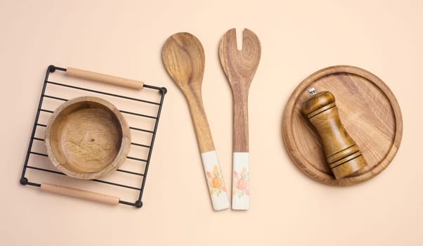 Kitchen wooden items on the table, top view