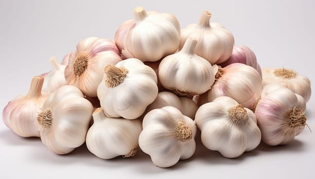 a pile of garlic on a light background.harvest .