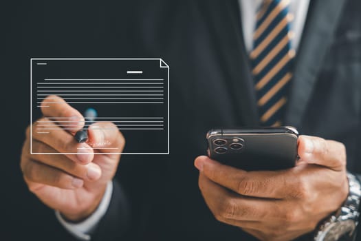 Professional businessman signs electronic documents on virtual screen using smartphone. Depicts seamless integration of technology and digital document management. Agreement is established.